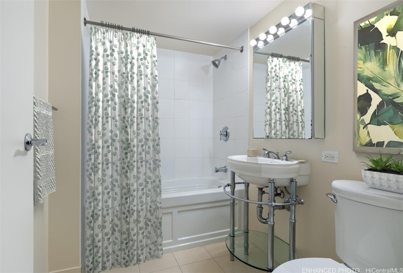 Convenient bath for your guests.  (Enhanced photo)