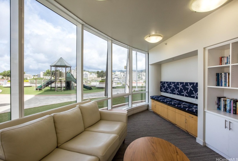 Quiet library looking out at kiddie playground.