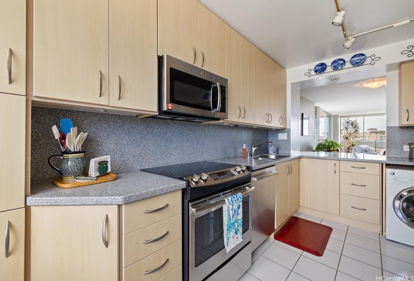 Efficient kitchen that feels open and airy.