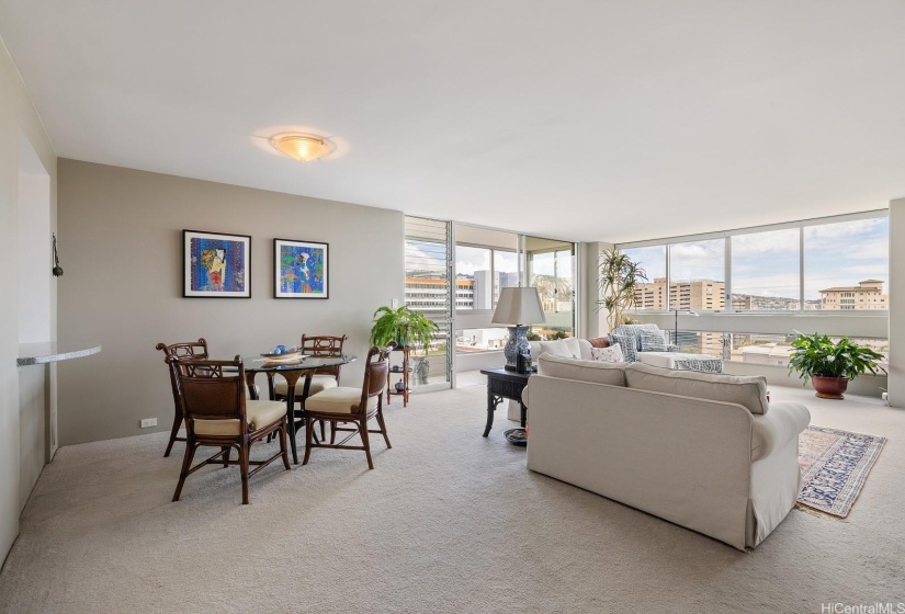 Corner/end unit with windows on three sides of this large 'single family feeling' living space.