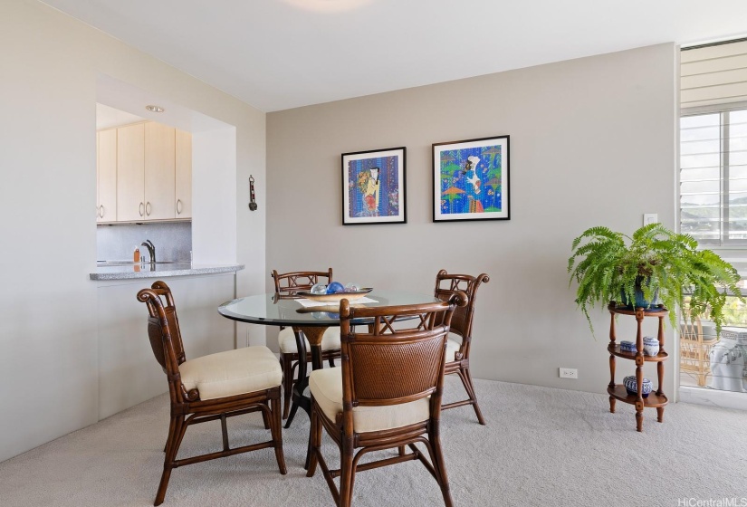 Dining area has a pass-through from the kitchen for convenience.