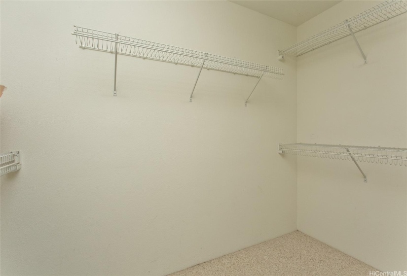 MASTER BEDROOM HUGE WALK-IN CLOSET.