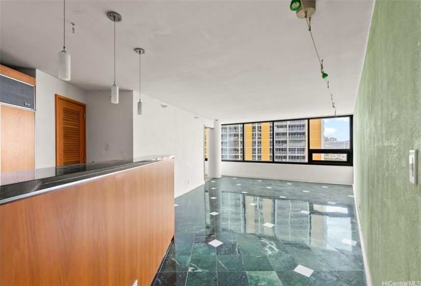 entry to kitchen, dining area, and living area