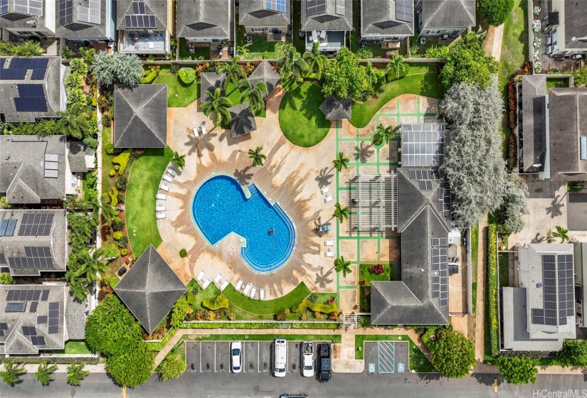 Walk only 7 houses down to the pool and visitor parking area.