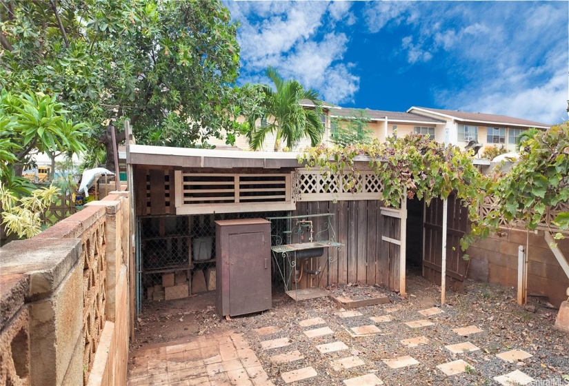 Large backyard with storage.