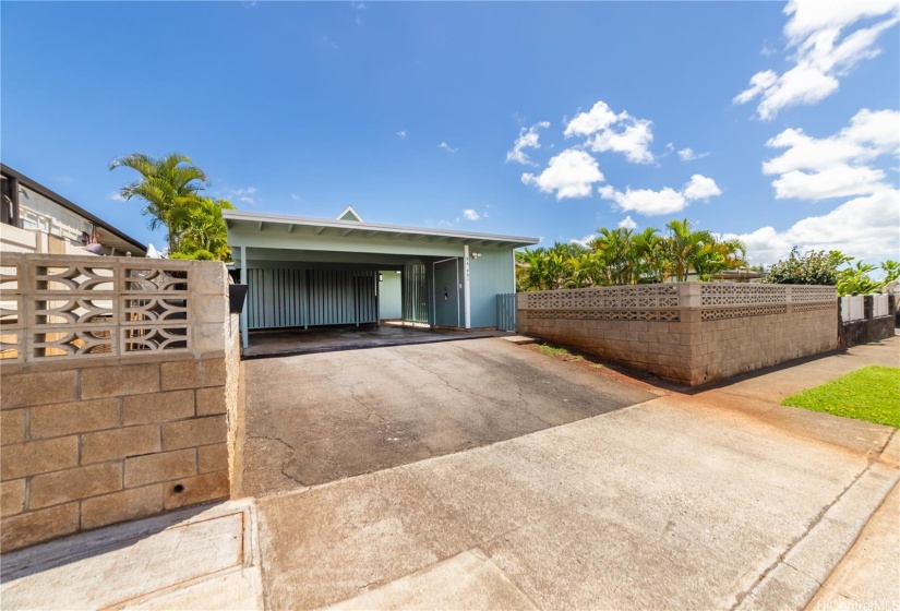 2 car carport~ with extra parking in the driveway.