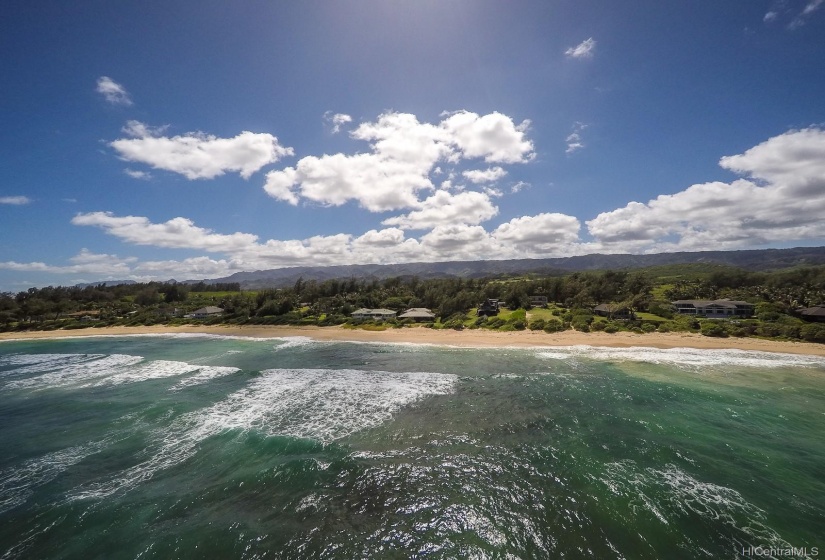 Malaekahana Bay, one of the most beautiful and peaceful beaches in the world with miles of white sandy beach