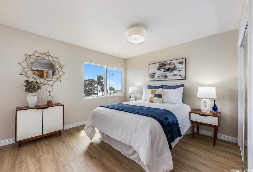 primary bedroom with ocean views