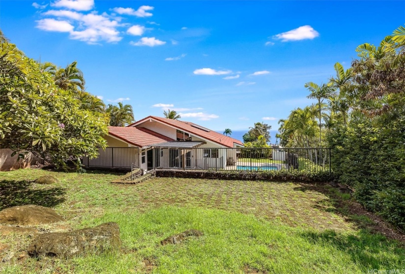 ample grassy backyard space