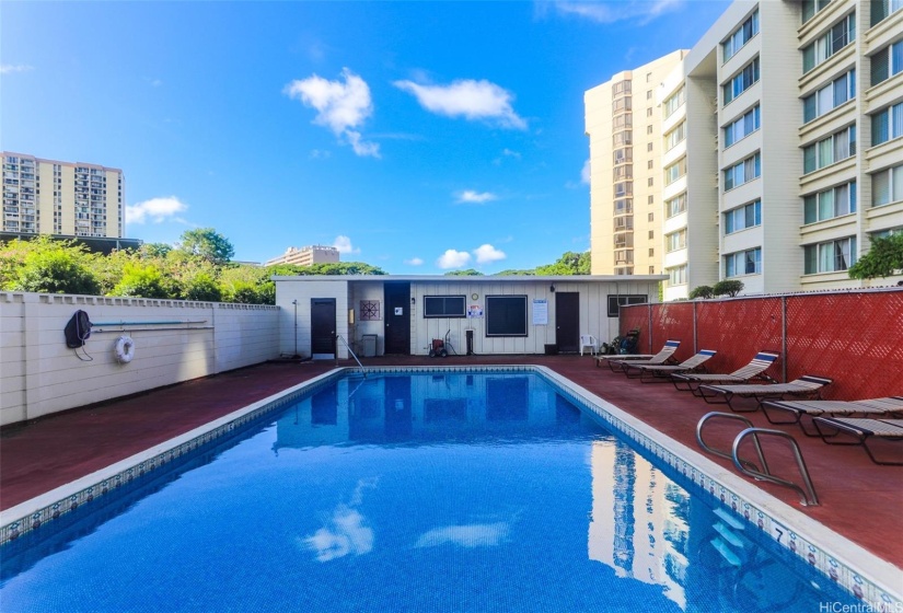 Inviting outdoor swimming pool area, perfect for relaxation and enjoying the sun in a serene setting