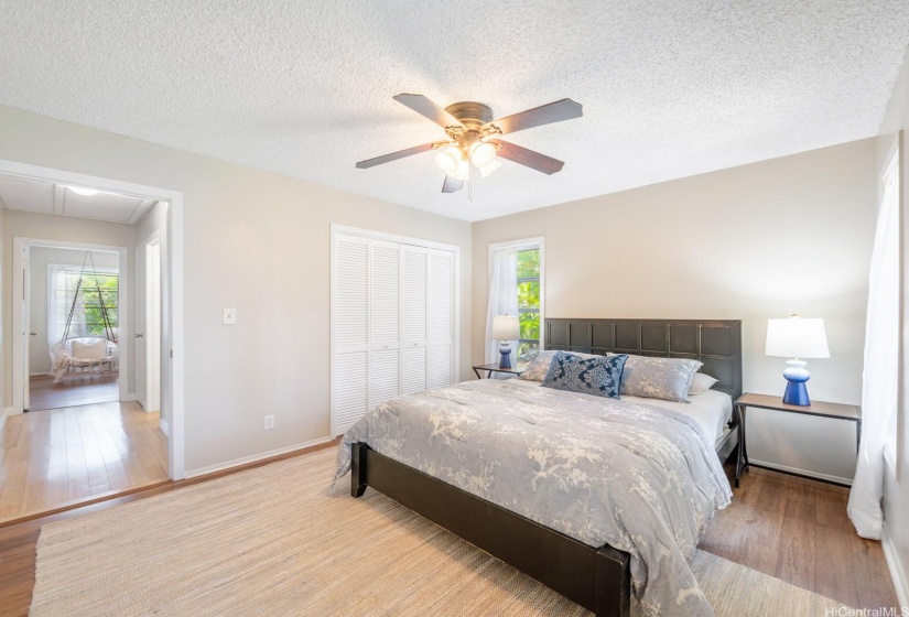 The other two upstairs bedrooms are very spacious, and feature plenty of windows, ceiling fans and large closets with closet systems.