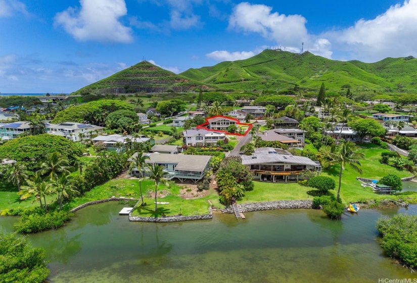 This gorgeous custom home in the Ko'olau Vista subdivision sits on a private lane with just 7 other custom homes. Directly on the border of Kailua and in the Kailua school district, this property is just 2 homes from the ocean and has deeded ocean access. The underground electricity and deeded view corridors ensure that this home maintains an unobstructed panoramic view of Kaneohe Bay and the Ko'olau Mountains.  This home is situated to have one of the best views on the lane.