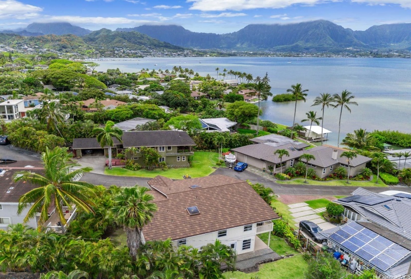 Gorgeous custom home in the Ko'olau Vista subdivision provides deeded ocean access to all 8 homes on this private lane. The underground electricity and deeded view corridors ensure that this home maintains an unobstructed panoramic view of Kaneohe Bay and the Ko'olau Mountains.  This home is situated to have one of the best views on the lane.