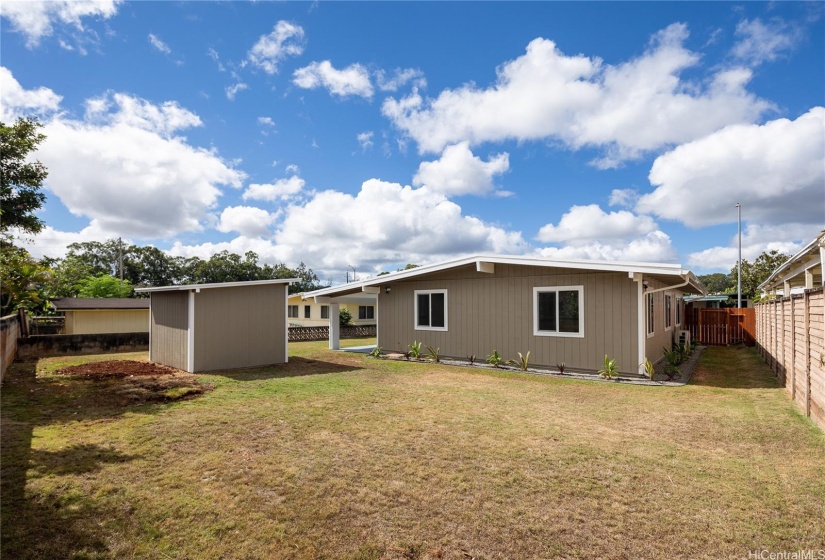 Large backyard ready for your personal touch.