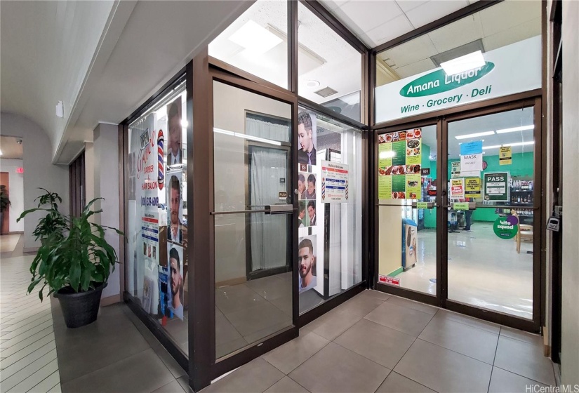 Convenience store & barber shop in lobby area