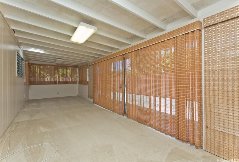 Approximately 240 sf enclosed lanai.