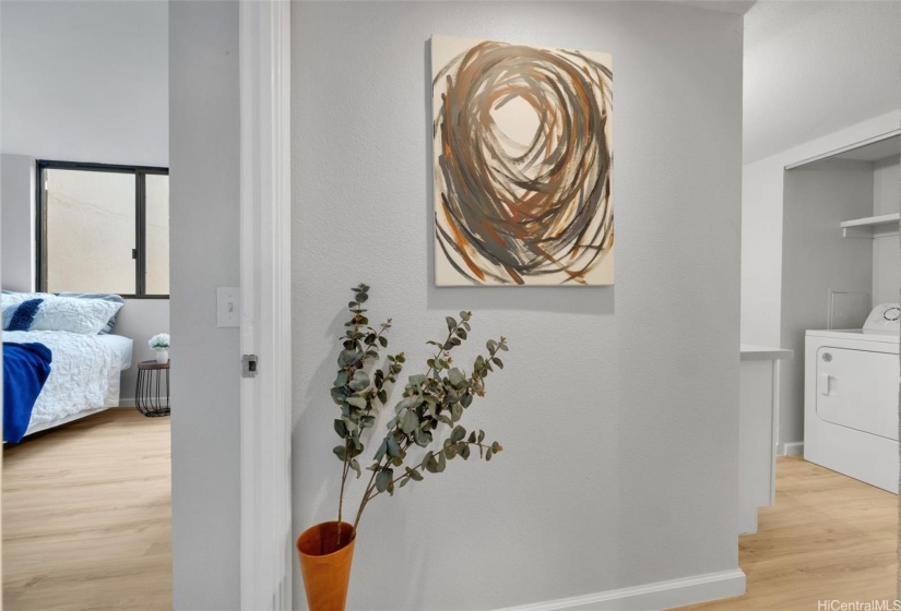 Hallway separates the two bedrooms and bathrooms