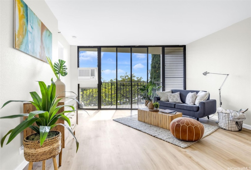 Enjoy this living room's privacy while looking out into lush greenery