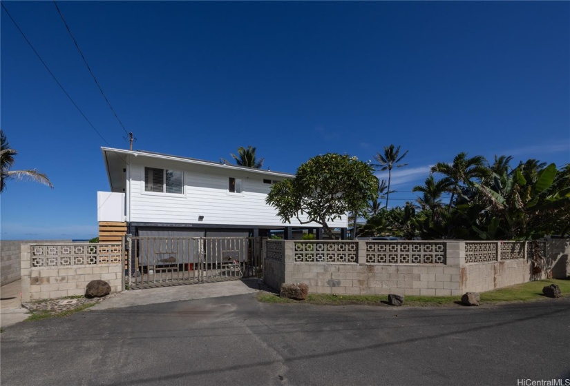 The end of the cul-de-sac with adjacent public access to the ocean and beach.