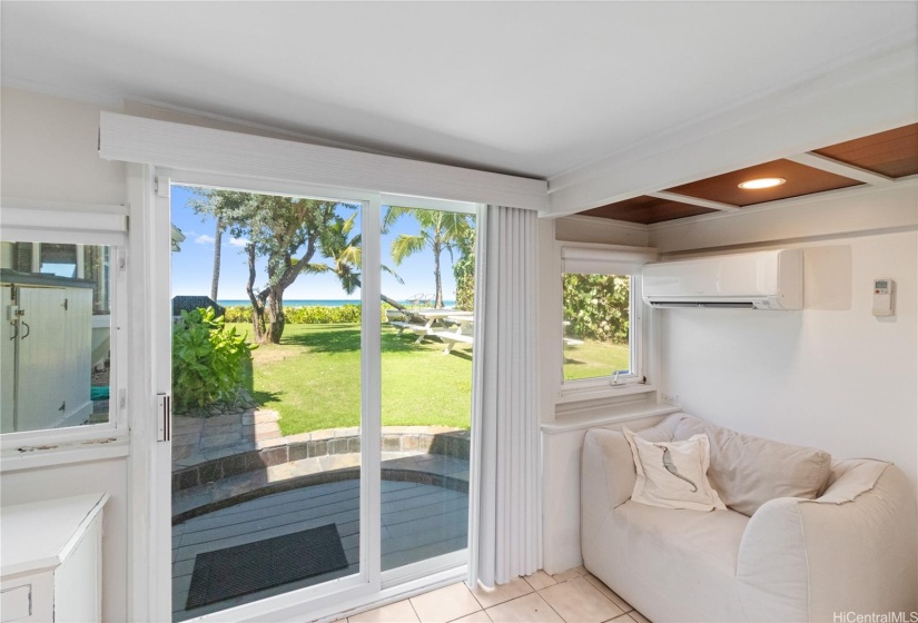 Ocean view ensuite third bedroom with side yard access. North Shore Haleiwa Hawaii.
