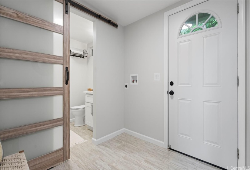 Upstairs entry area, bathroom on the left side