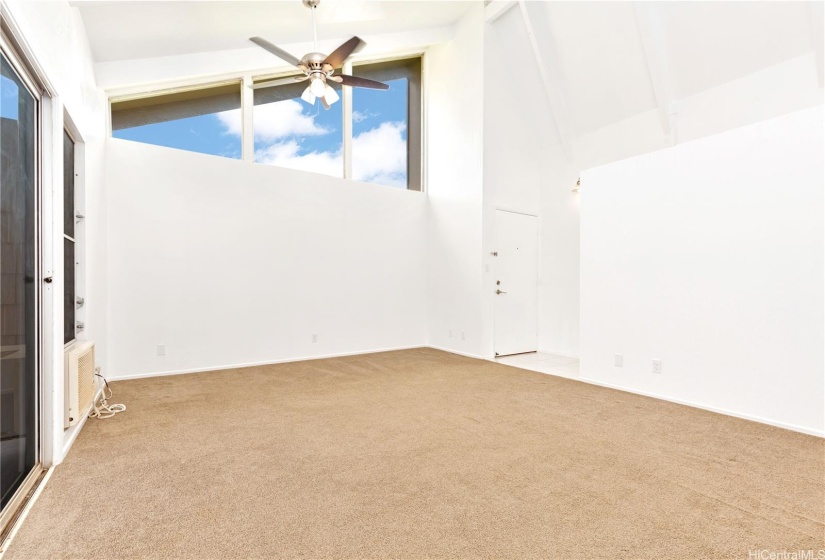 Looking across the living room from the kitchen pass through.