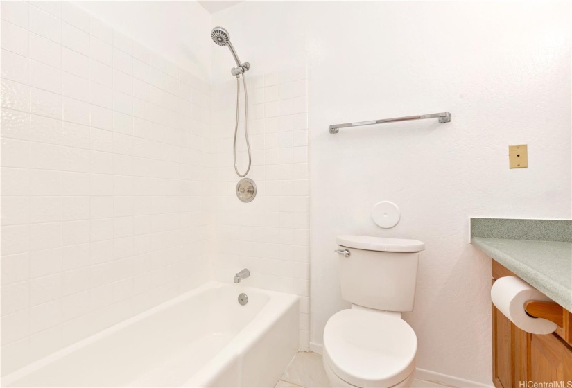 A large bathroom is convenient & well-appointed. You will like the recently refinished tub & enclosure.