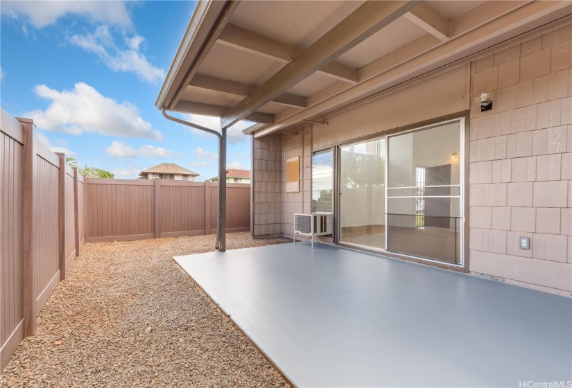 Look how close the patio is to the living room.  Could your dog run here?