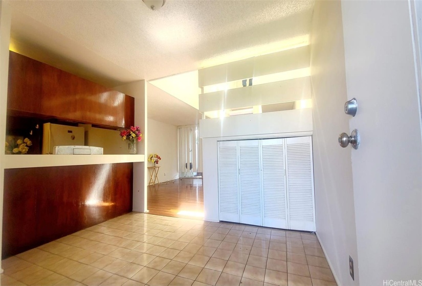 DINING AREA WITH STORAGE UNDER STAIRS