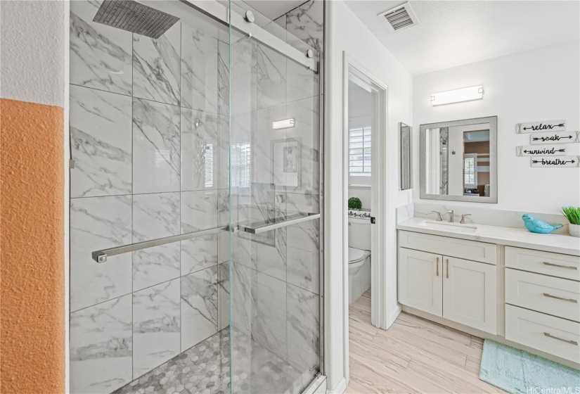 Primary Bathroom Also Includes a Separate Shower