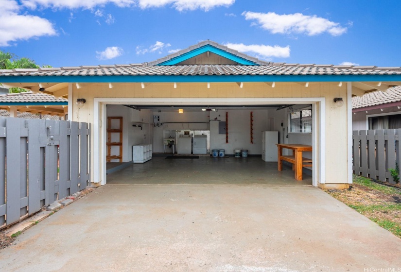 Two car garage with nicer / less traffic alley behind fronting street.