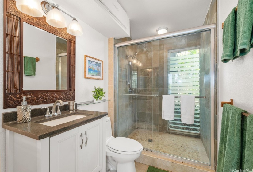 The hall bath features a walk in shower.