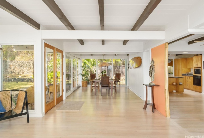 Looking towards the separate dining area with walls of windows.