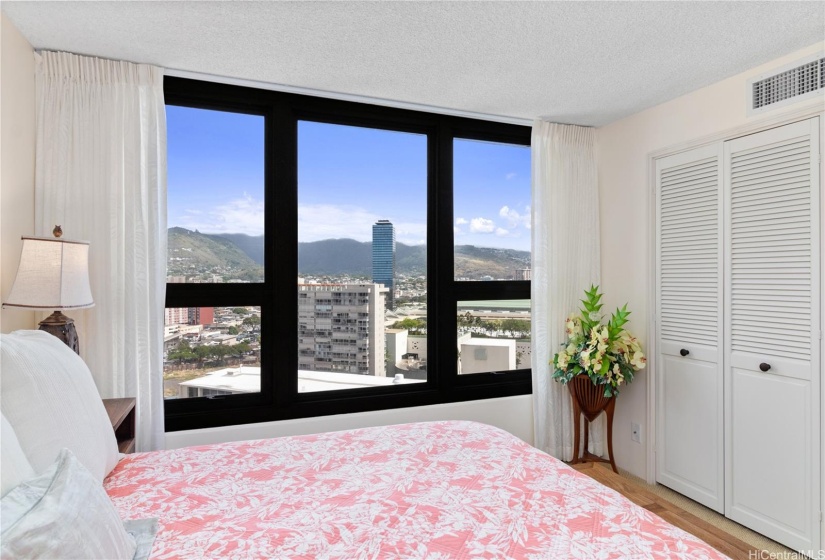 GUEST BEDROOM WITH MOUNTAIN AND CANAL VIEWS.