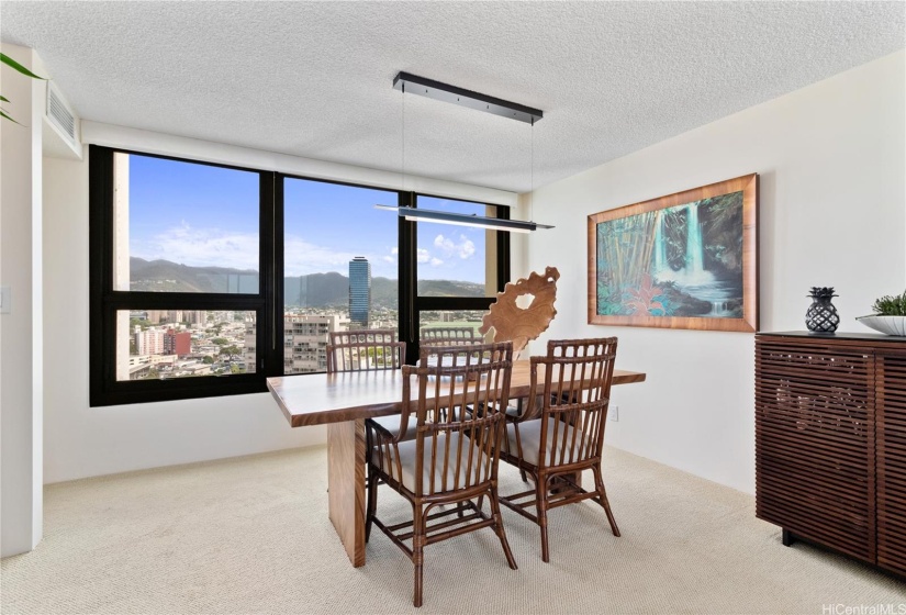 DINING AREA WITH VIEWS FROM BOTH SIDES OF THE TABLE.