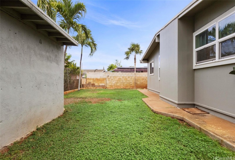 Back yard space perfect for gardening, sports practice, and more! Plus, bonus storage shed!