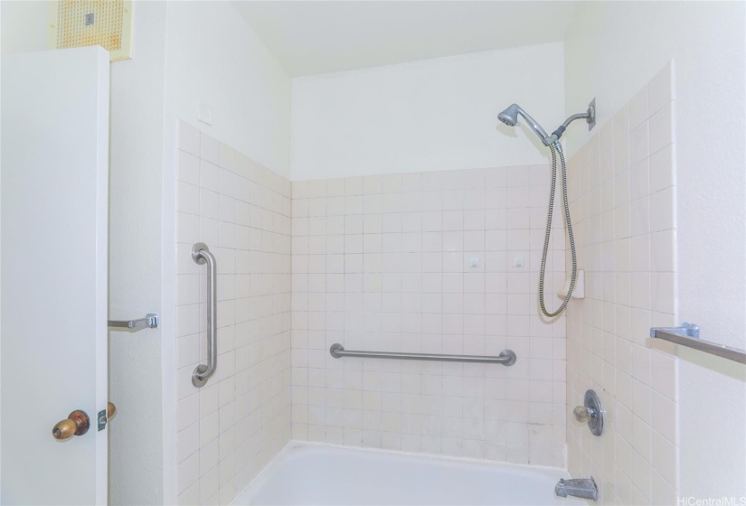 Primary bathroom with shower and tub