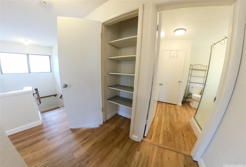 guest bathroom and hallway closet