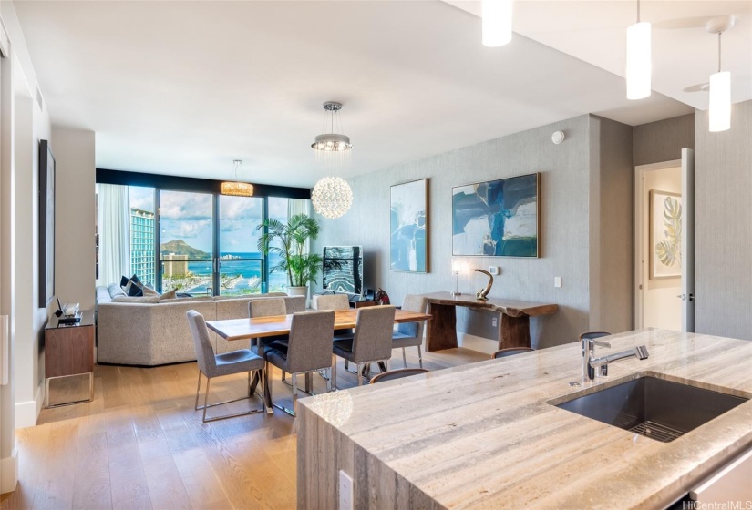 This Penthouse has brody oak flooring and a Titanio Nero travertine kitchen island.