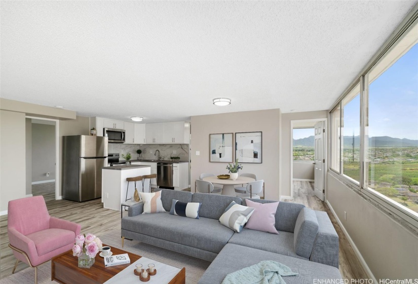 Spacious Open Floor Plan from Living to Kitchen Area. Enhanced: Photo is virtually staged.