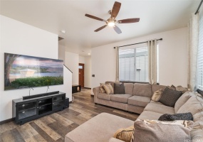 Spacious living room with Luxury Vinyl Plank Flooring throughout the Downstairs