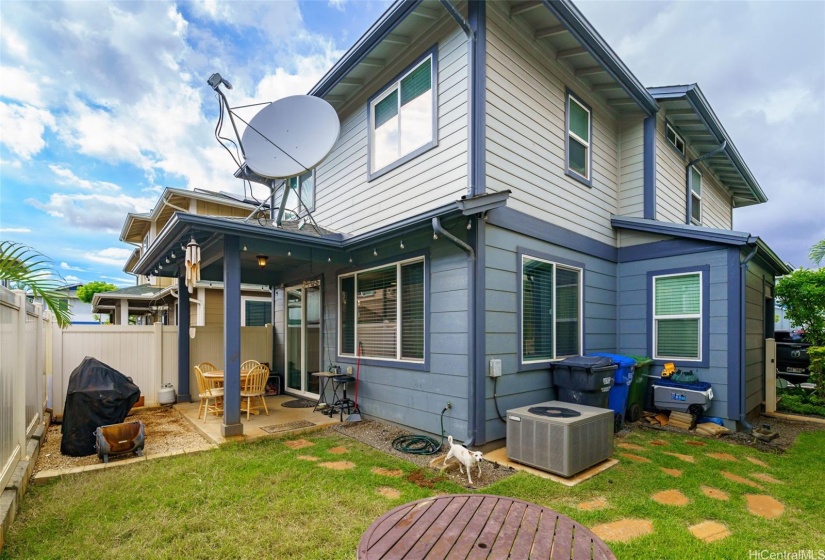 Spacious private yard with covered patio area