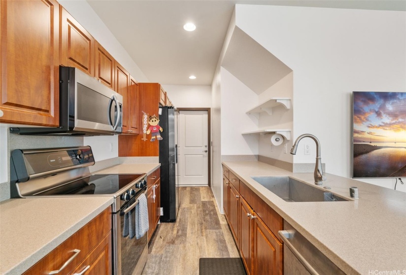 Wood Cabinets with Corian Solid Surface Countertops