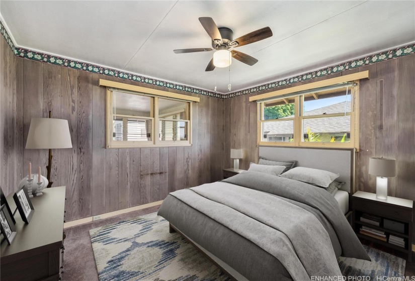 Enhanced/ virtually staged back bedroom.