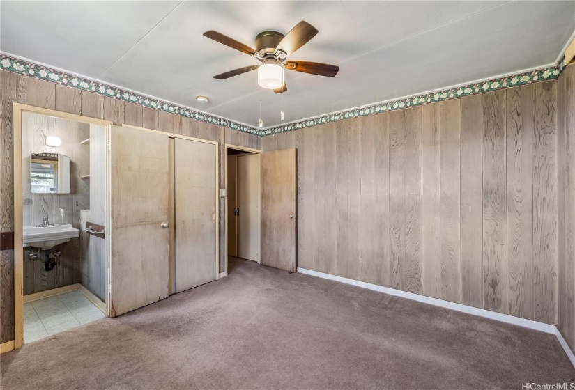 Back bedroom has a half bath.