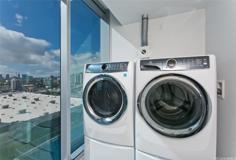 Full size washer and dryer in laundry room