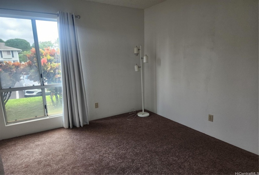 Second bedroom facing the front of building.  All rooms have new drapes.