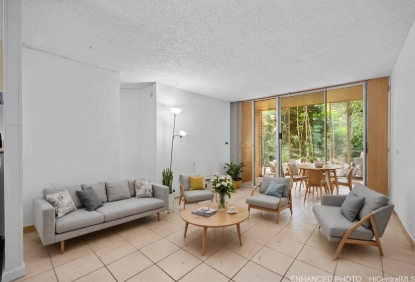 Enhanced photo with virtual staging of the living room.