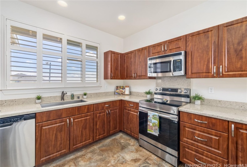 Kitchen. Staged. Enhanced photo.