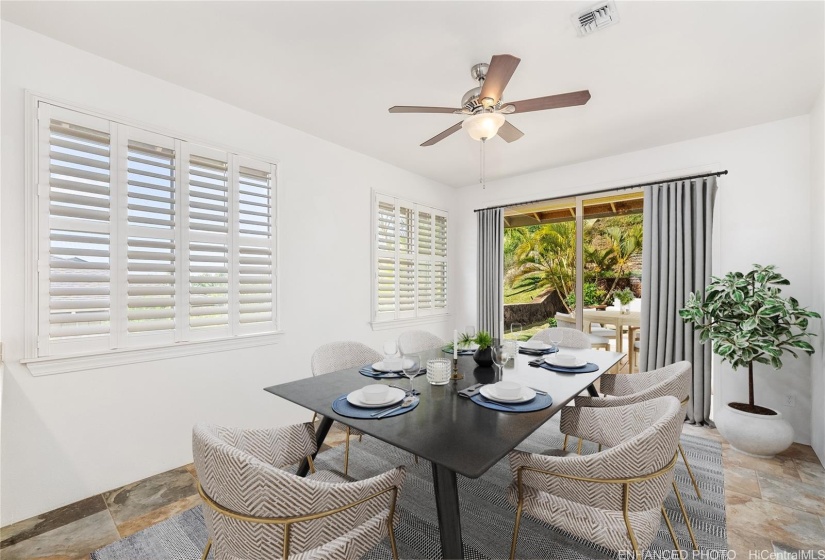 Dining area in the kitchen. Different angle. Virtually staged. Enhanced photo.